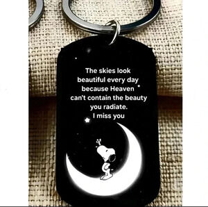 Snoopy in memory of someone we love quote keychain
